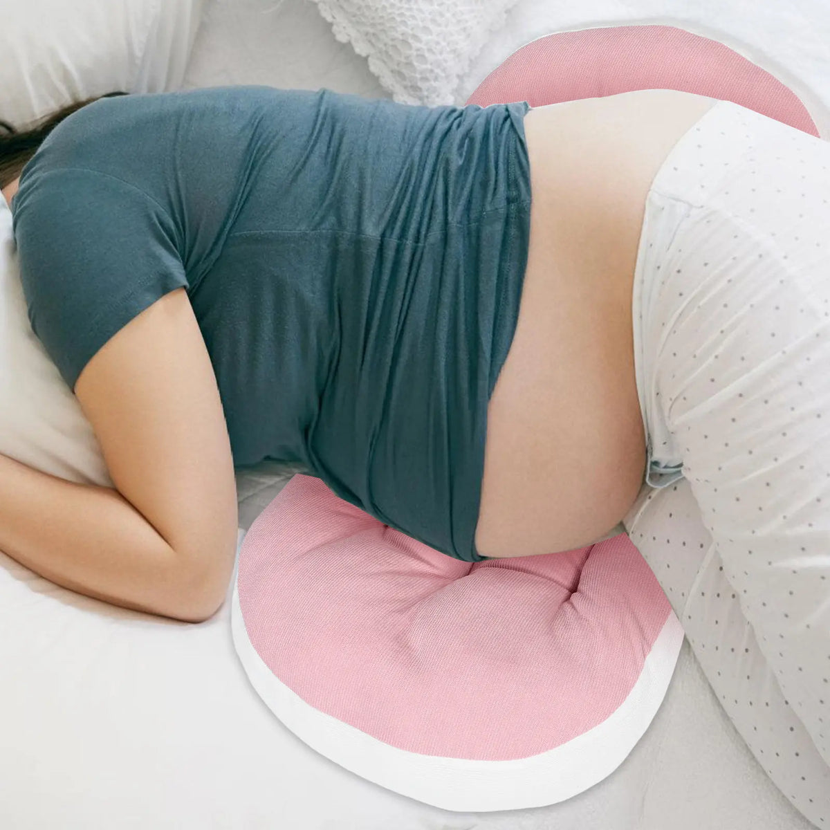 Maternity pillow supporting lower back during pregnancy